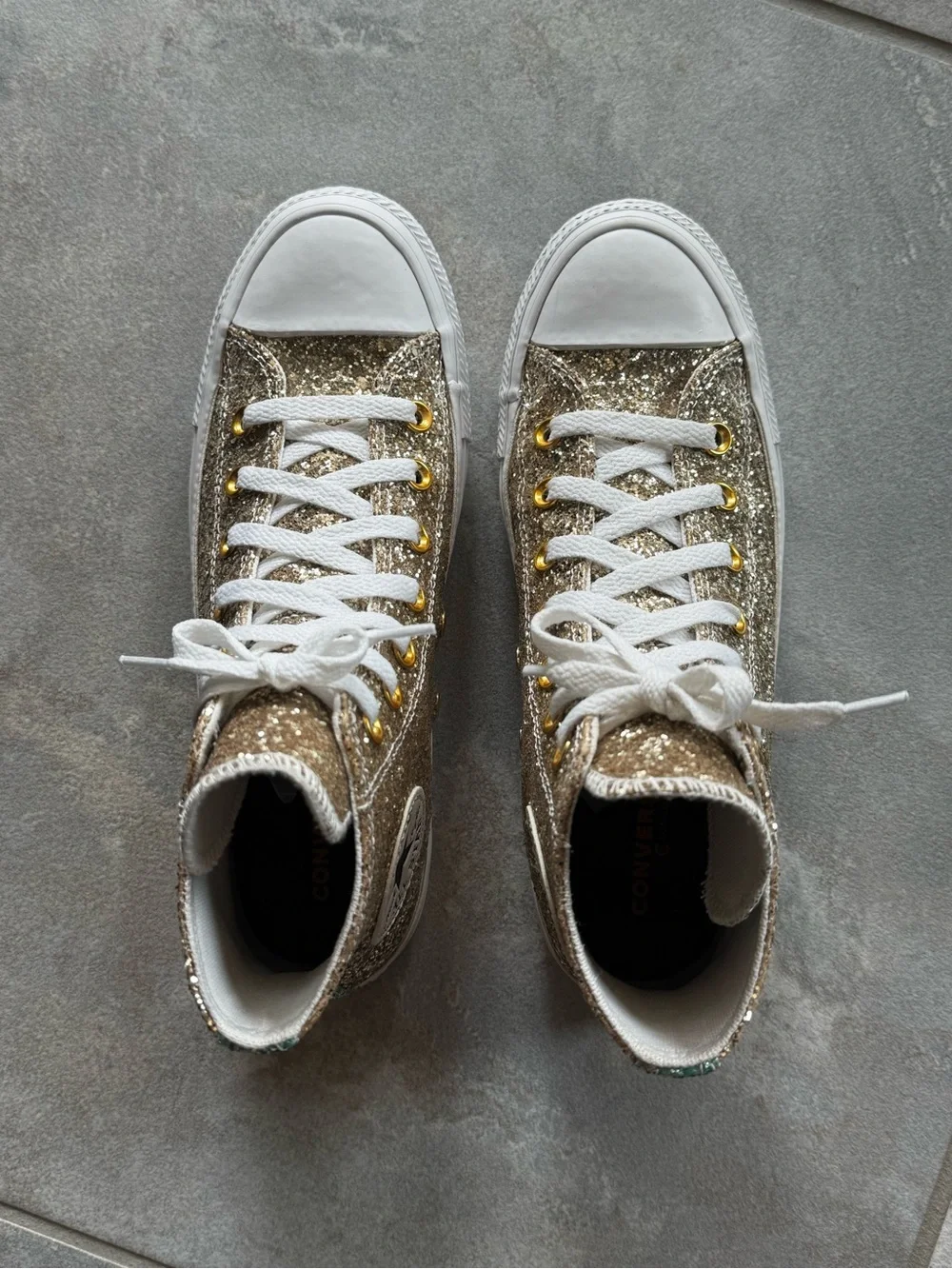 Gold glitter high top converse
